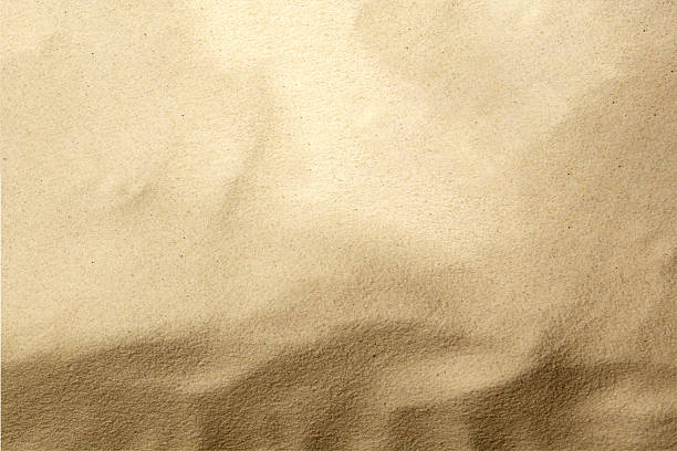 istock Closeup view of sand with abstract texture. Beach scene. Summer concept. Top view 2225470837