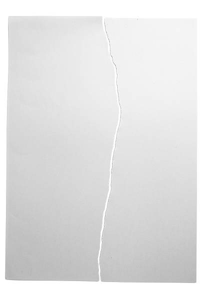 istock Gap of a ripped white paper on a white background. Copy space 2225473093