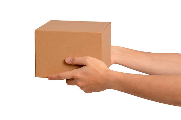 istock Hand holding parcel box isolated on white background. Concept for transportation and delivery. 2225491732