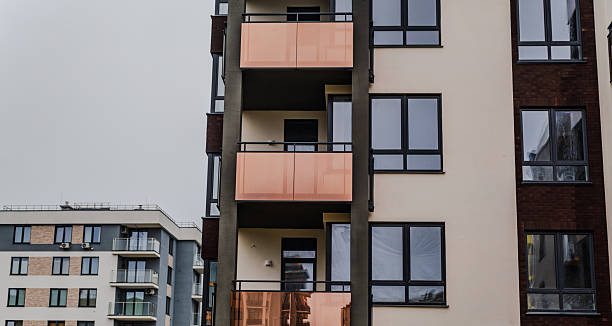istock Modern Residential Buildings With Balconies Under a Cloudy Sky in an Urban Setting 2225498178