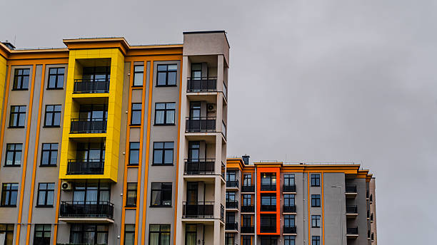 istock Modern Residential Buildings With Balconies Under a Cloudy Sky in an Urban Setting 2225498237