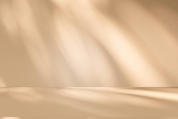 istock Studio style background wall decoration presentation uses white and beige tones. with shadows cast from a nearby window, concept creating a decorative 2225501881