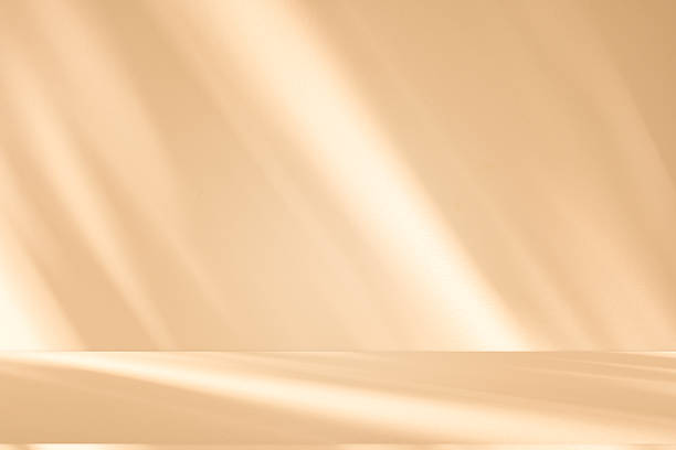 istock Studio style background wall decoration presentation uses white and beige tones. with shadows cast from a nearby window, concept creating a decorative 2225501917