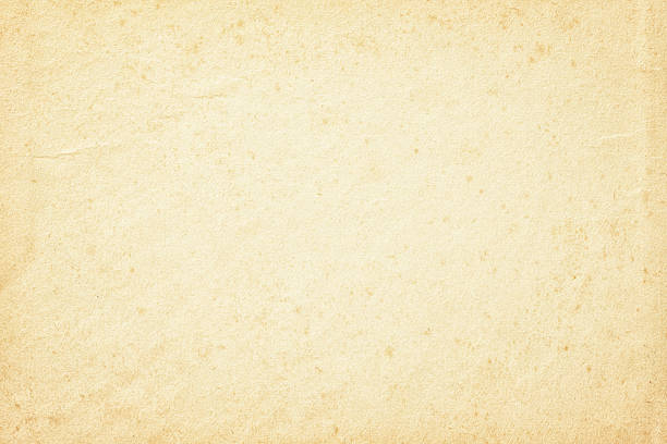 istock Paper background. old paper canvas faded over time 2225508480