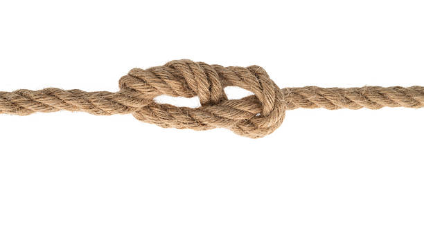 istock Big overhand knot on the brown hemp rope 2225510338