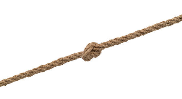 istock Overhand knot tied on brown hemp rope 2225510421