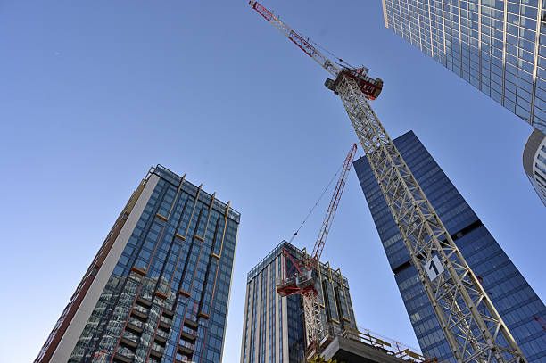 sky,city view,big city,skyscrapers,construction crane,metal structures,skyscraper construction,modern city,modern architecture,warsaw,europe,investments,offices