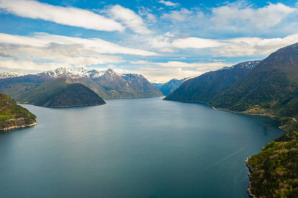 istock Hardanger fjord with deep waters stretching towards horizon 2225512812