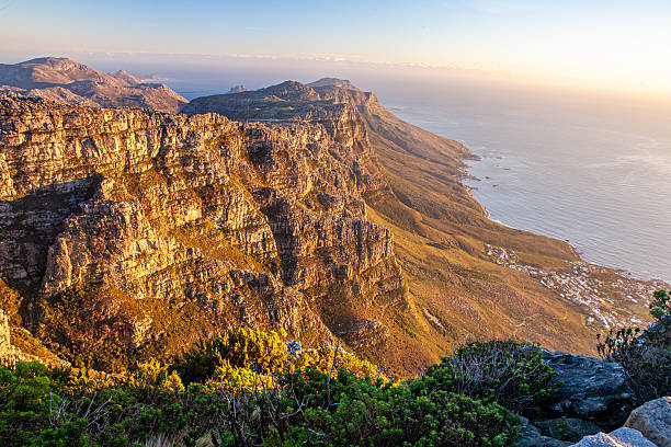 istock Dramatic Cliff View from Table Mountain at Sunset, Cape Town, South Africa 2225513562