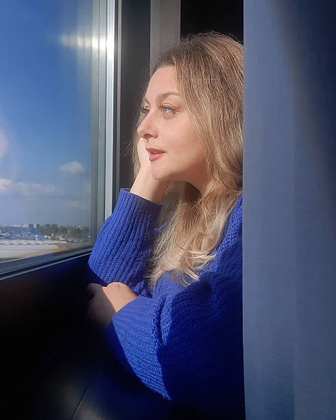 istock Woman in blue dress 2225514786