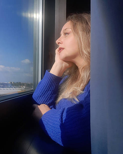 istock Woman in blue dress 2225516170