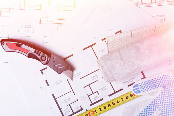 istock Building plan. Linoleum and flooring installation tools. Repair in the house. 2225517742