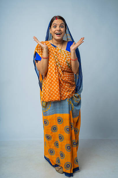 istock Excited woman in sari on white background 2225517869