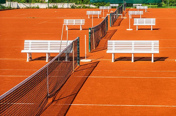 Aerial view of empty clay tennis court