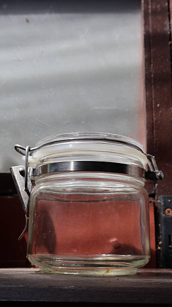 Glass jars placed in a vintage-style kitchen