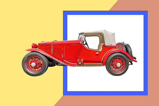 istock red retro automobile on color background 2225523922