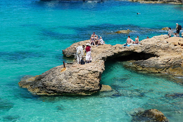 Comino,Malta. 23 April 2025. People having fun in blue turquise water in blue bay