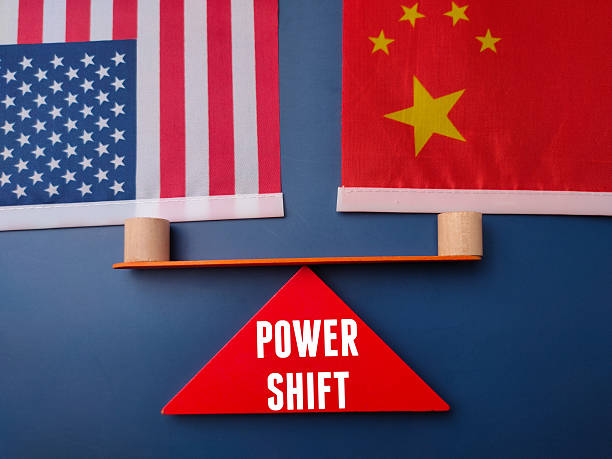 istock Us and china flag with the word POWER SHIFT on a blue background. 2225529237