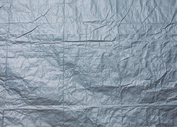 istock The wrinkled texture of the gray canvas background 2225532814