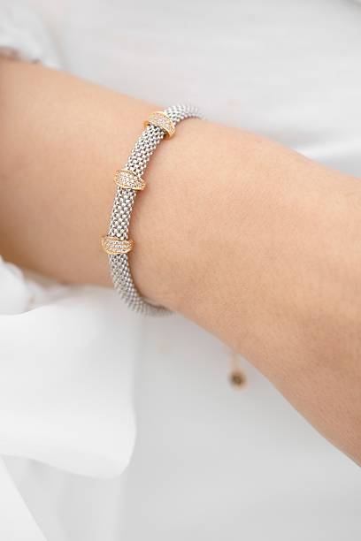 istock Elegant silver bracelet with gold accents 2225534549