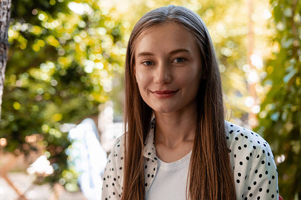 istock Young Woman Smiling and Posing in a Garden 2225535525