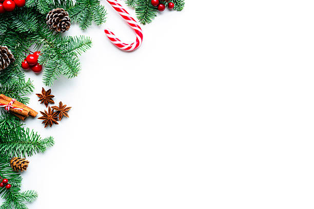 istock Christmas frame with fir tree and decoration on white background. Copy space 2225538867