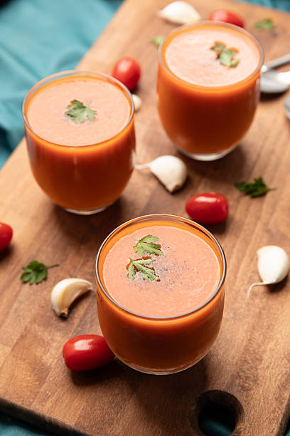 istock Spanish traditional cold tomato soup, gazpacho, served in small glasses. 2225541413