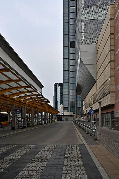 istock Warsaw, skyscrapers, modern city, architecture, structures, office, gray sky, concrete jungle, homosapiens, train station, metal structures, human environment, street 2225546689