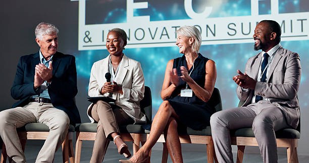 istock Happy people, speaker and seminar with applause for presentation or innovation at workshop. Group, employees or spokesperson clapping with smile or meeting for speech, tech campaign or development 2225548382