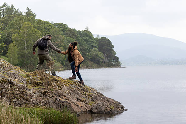 istock A Helping Hand Up Rocky Terrain 2225549494