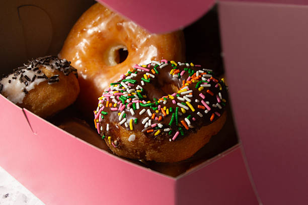 istock pink box of donuts 2225549642