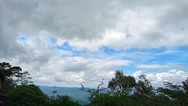 istock Looking Down from Mount Nglanggeran: Lush Lowlands and Villages Below 2225551142