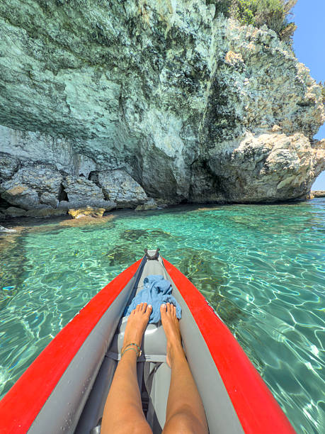 istock Kayaking Toward Rocky Coastal Cave Entrance 2225555282