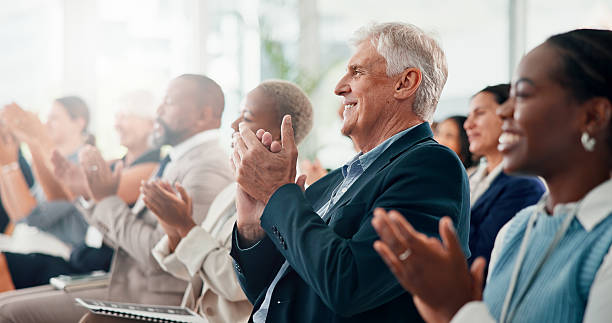 istock Conference, applause and business people with achievement, seminar and feedback with support. Audience, crowd and group in workplace, clapping and success with thank you, goals or event with cheering 2225556787