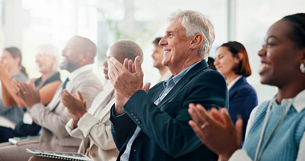 istock Conference, applause and business people with support, seminar and feedback with awards. Audience, crowd and group in office, clapping and success with profit growth, cheering or company development 2225556793
