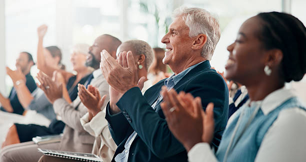 istock Conference, applause and business people with cheering, seminar or feedback with support. Audience, crowd or group with clapping, profit growth or smile with thank you, kpi target or event for awards 2225556794