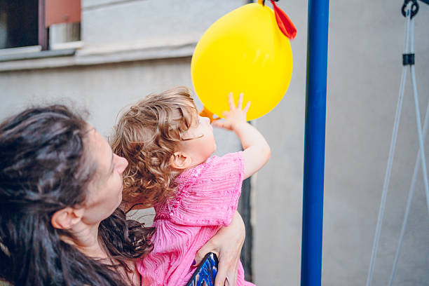 istock Mom playing with the baby. 2225562537
