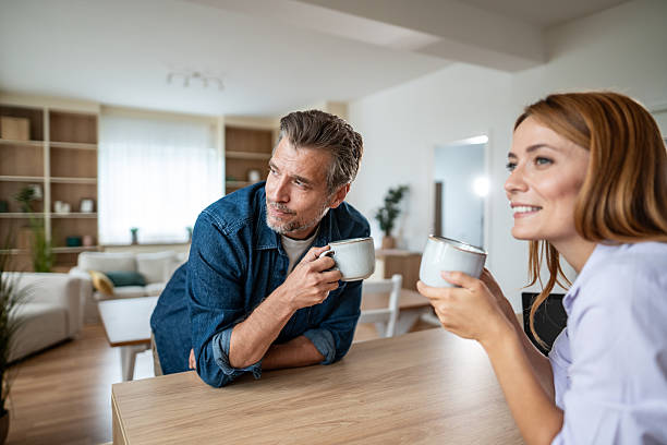 istock Couple enjoying a relaxing morning coffee at home 2225567978