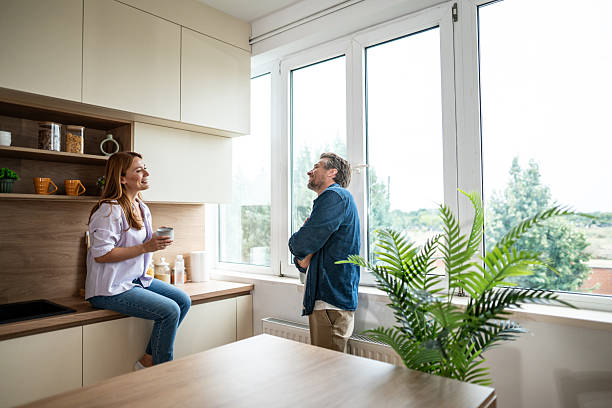 istock Couple enjoying a relaxing morning together in their modern kitchen 2225568071