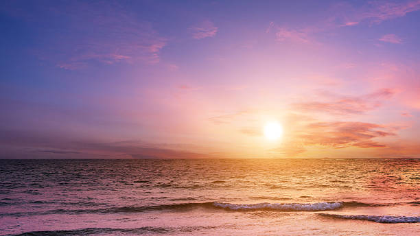 istock Beautiful sunset sky over on the sea background. 2225570273