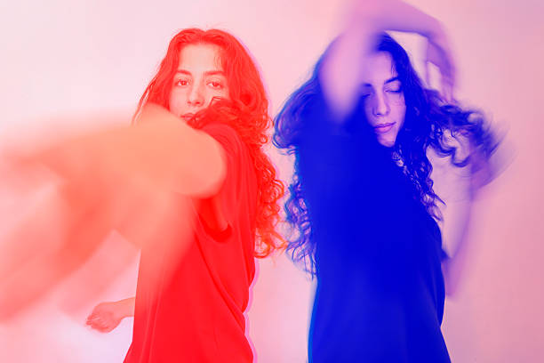 istock Young woman dancing. Duplicate two-tone image 2225570505