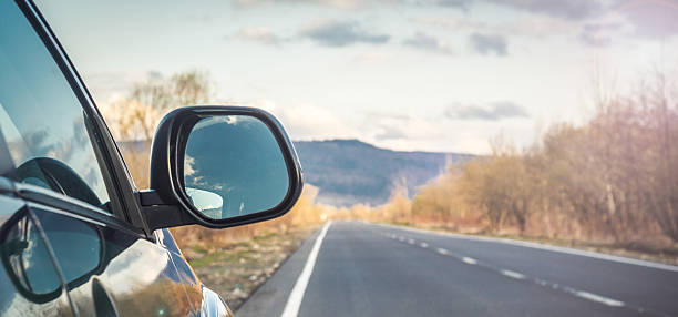 istock car for traveling with a mountain road 2225571429