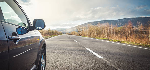 istock car for traveling with a mountain road 2225571473