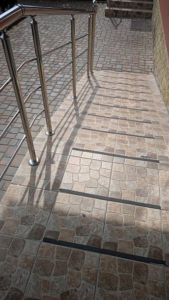 istock A Beautiful and Stylish Set of Stone Steps Featuring Railings in Bright Natural Light 2225575651