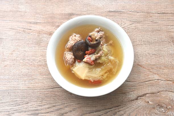 istock boiled cabbage stuffed mashed pork with glass noodles topping mushroom n soup 2225578791