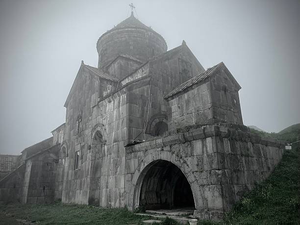 Armenia - Haghpat monastery - in the fog medieval Armenian monastery complex in Haghpat, Armenia, built between the 10th and 13th century.The location of Haghpat Monastery was chosen so that it overlooks the Debed River in northern Armenia's Lori region. It was built partway up a hillside on a site chosen to afford protection and concealment, but also because of the monks' monastic humility. It is built on a leafy promontory in the middle of a cloudy cirque.mai 4, 2025