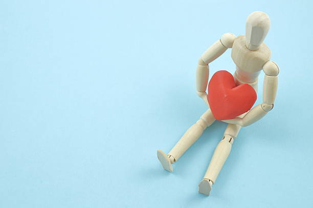 istock Human heart embracing love, quietly shining. 2225581251