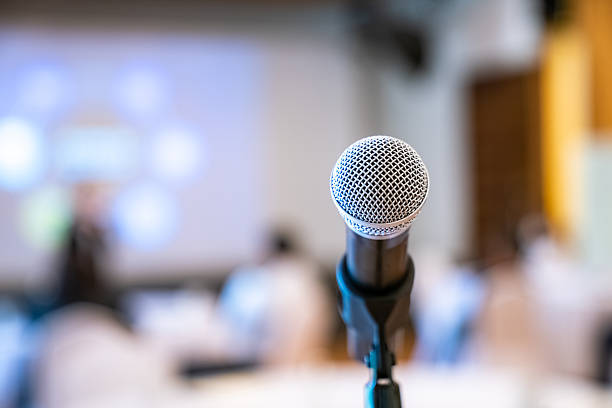 istock microphone is on microphone stand in seminar meeting room for everyone to use when speaking or greeting seminar participants. 2225584325