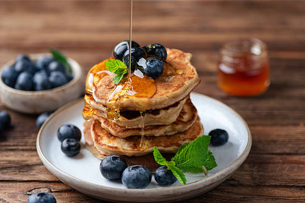 istock Oat pancakes with blueberries and maple syrup 2225587745