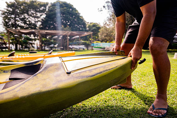 istock Man preparing a kayak outdoors 2225588272